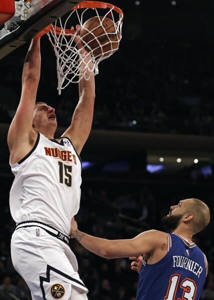 Jokic gets 32 points in just 27 minutes Nuggets rout Knicks AP News